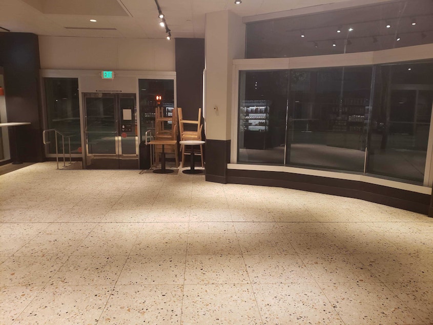 caption: The Starbucks at 2nd Avenue and Seneca Street, March 16, 2020. The first weekday after Gov. Jay Inslee ordered no public gatherings more than 50 people, and shut down restaurants and bars statewide. Starbucks also recently announced that it was halting in-person service and only doing to-go service. 