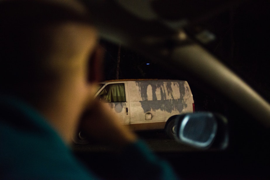 caption: One Night Count Team Lead Daniel Hubbell spots a van that volunteers reported as occupied while driving down a deserted side streets in one of the last stops of the night. Click on this image to see the slideshow.