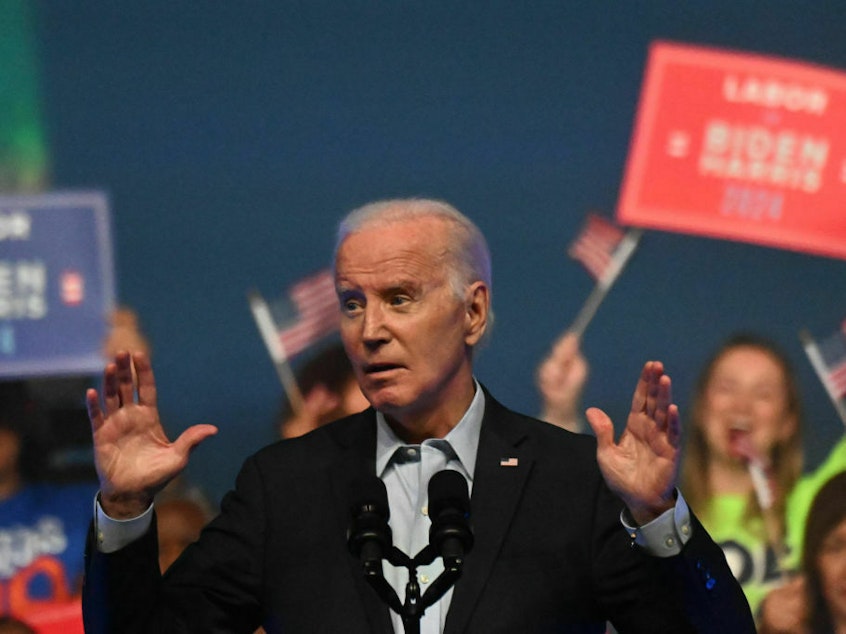 caption: President Biden addresses union workers on June 17 in Philadelphia. His campaign announced fundraising numbers for April through June on Friday.