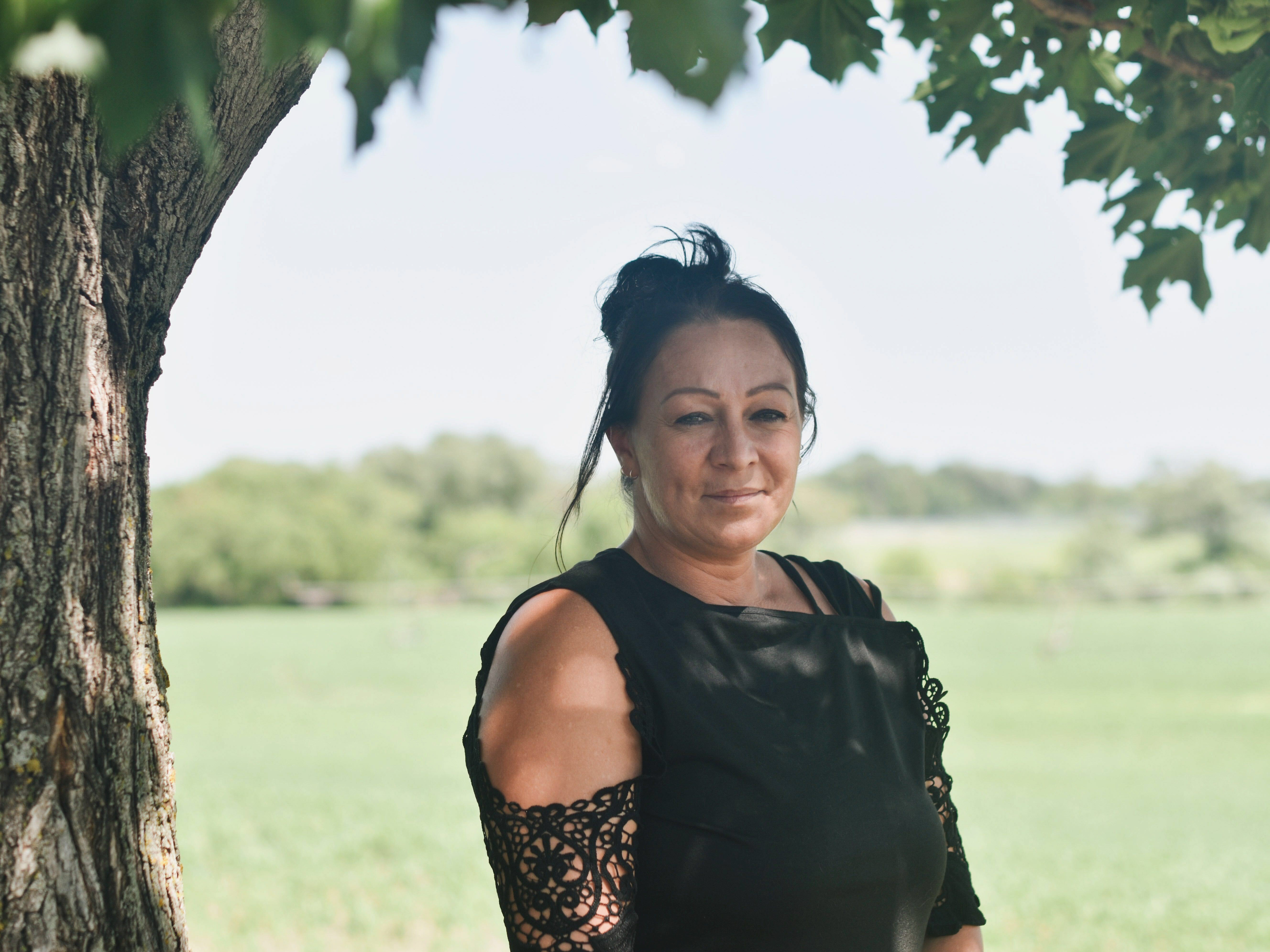 caption: "This will help a lot of single parents out there," Daisy Hohman, a Minnesota mother whose tax refunds were garnished after her three children were placed in foster care, says of the change in federal guidance.