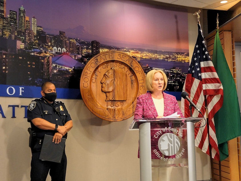 caption: Mayor Durkan and Chief Diaz respond to reporters after a weekend of fatal shootings on Monday, July 26, 2021.