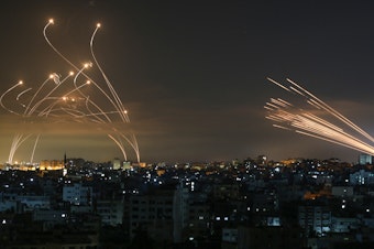 caption: The Iron Dome intercepts rockets fired by Hamas in May, 2021.