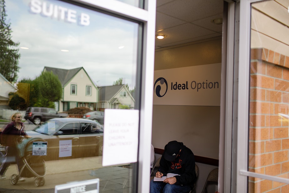 caption: A patient waits inside Ideal Option clinic in Everett, Washington. (Finding Fixes)