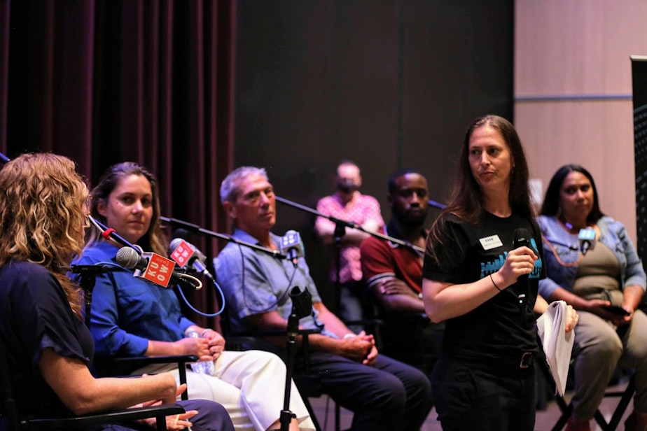 caption: A group of panelists take questions at KUOW's Unpack the Story event on Wednesday, Aug. 3, 2022 at the Seattle Public Library in downtown Seattle. From left to right: Dr. Taryn Hansen, Lara Okoloko, Johnny Ohta, Deaunte Damper, Anna Boiko-Weyrauch, and Malika Lamont.