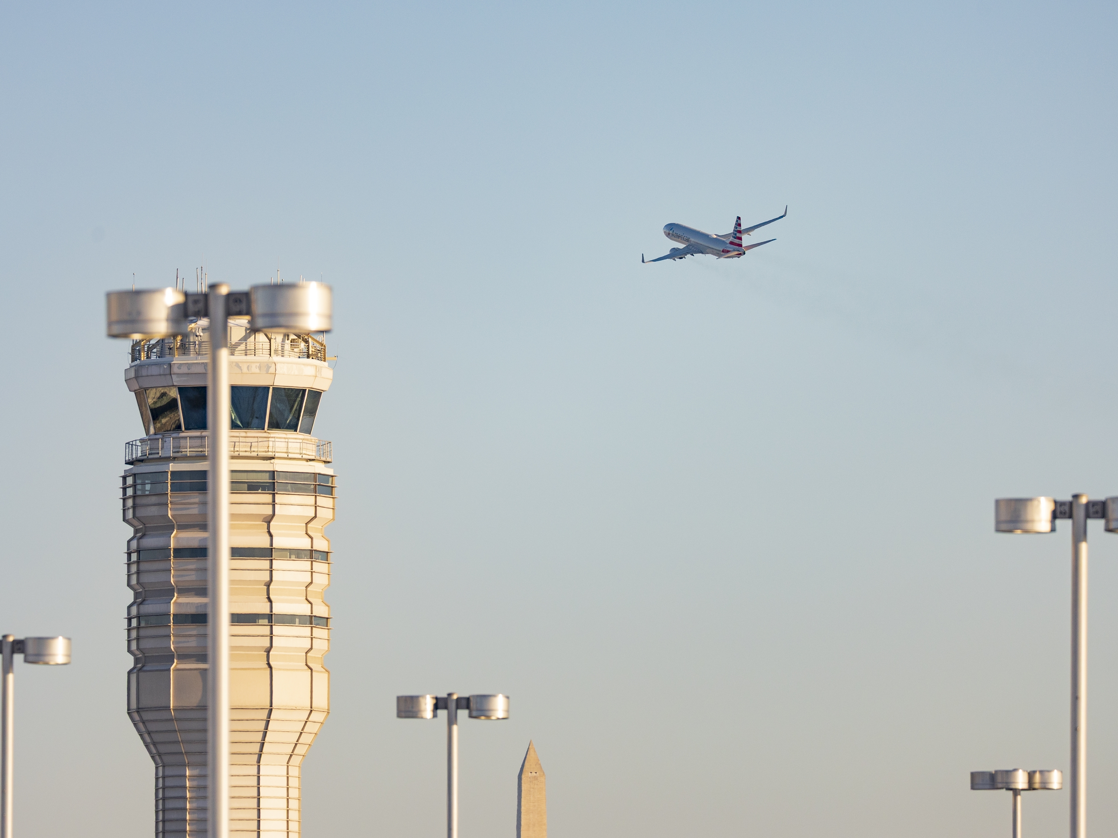 caption: Regulators at the Federal Aviation Administration are tightening safety rules in congested airspace around major airports, suspending the use of visual separation and helicopters. The move comes after an American Airlines jet and a U.S. Army Black Hawk helicopter collided near Washington, D.C. last year, killing 67 people.