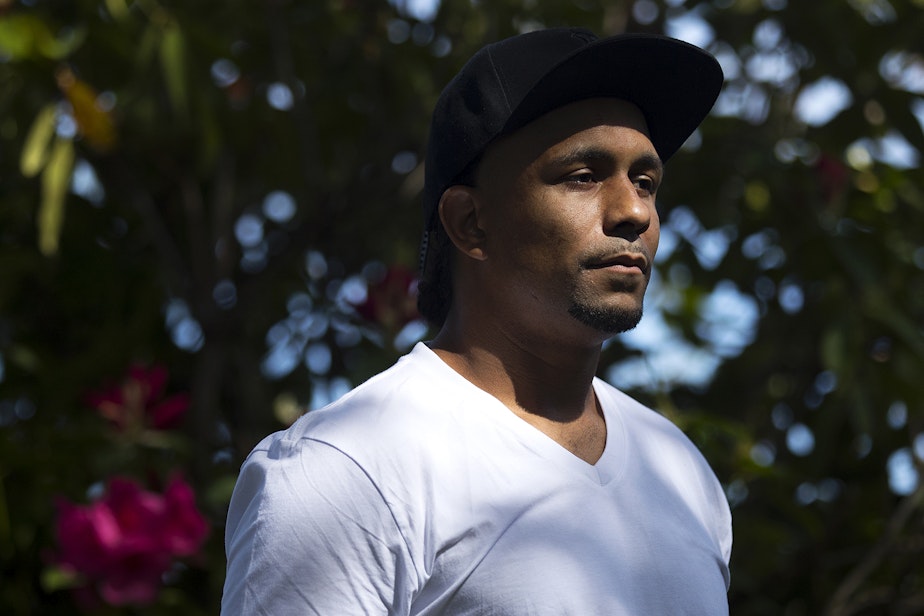 caption: "We were scared to death in there," said Wesley Mitchell. Here, Mitchell stands for a portrait on Sunday, May 10, 2020, in Seattle. “I’m a non-violent offender with a drug charge,” said Mitchell. “I’ve got health issues; I’ve got asthma – it could easily be a death sentence for me if I were to catch it.”