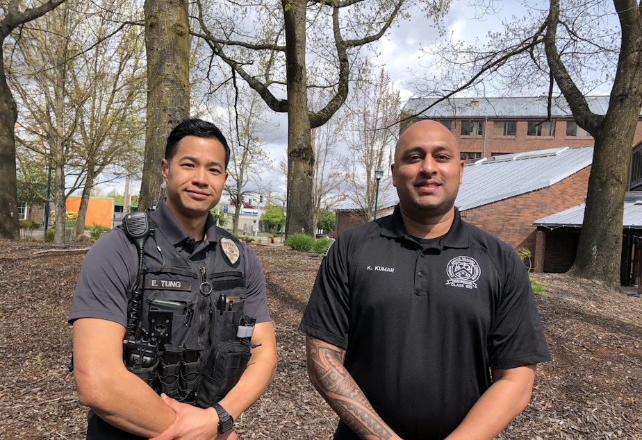 caption: Kent recruiter Sgt. Eric Tung, left, and one of the agency's newest officers, Krishan Kumar. Kumar said he applied to work in Kent because his family lives there and it's a diverse city. His ability to speak Hindi got him a salary increase.