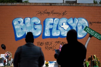 caption: A mural memorializes George Floyd is his hometown of Houston, where he was known as Big Floyd, and part of the city's hugely influential Screwed Up Click rap collective.