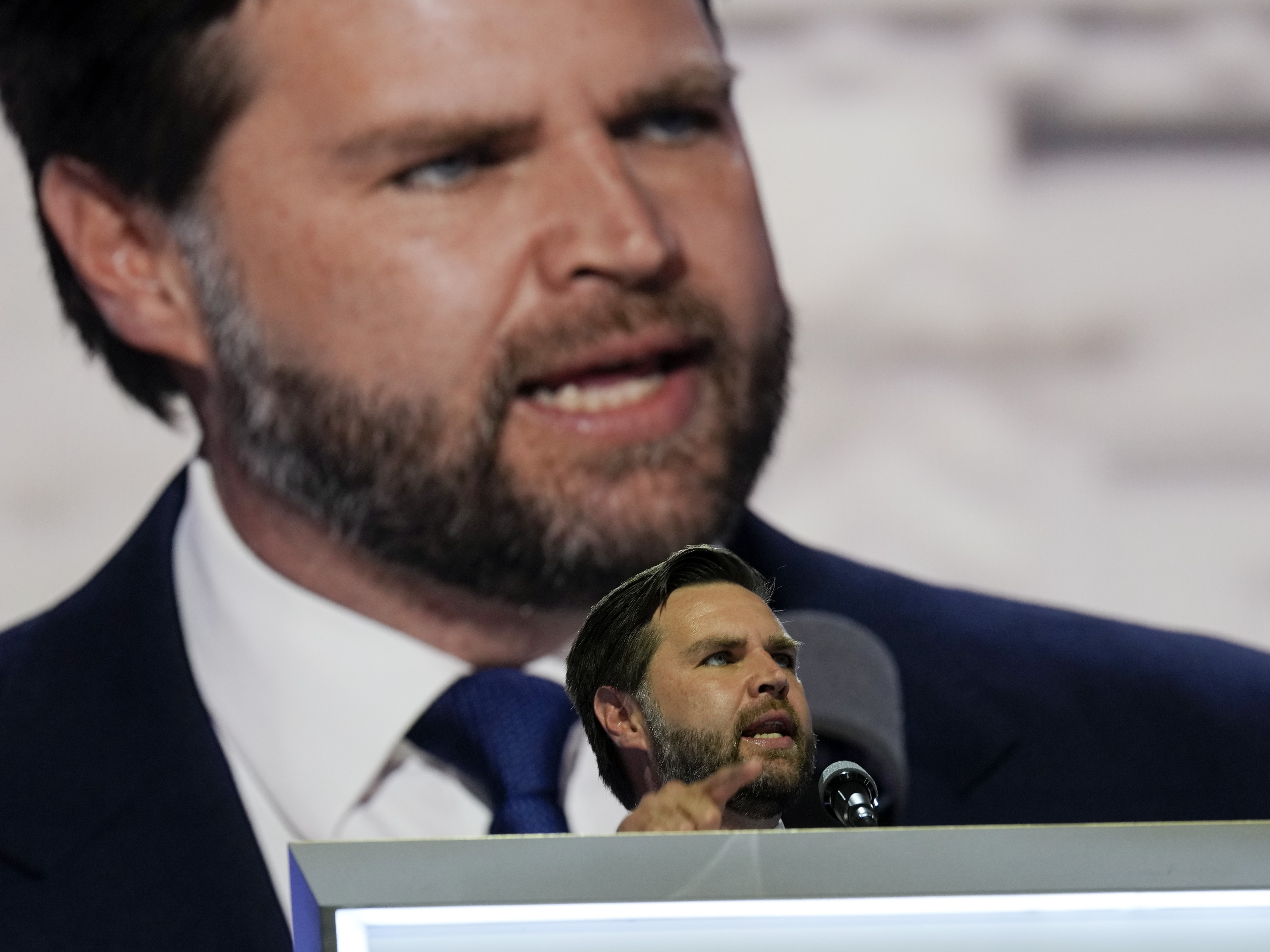 caption: Republican vice presidential candidate Sen. JD Vance, R-Ohio, speaks at the 2024 Republican National Convention on July 17 in Milwaukee. 
