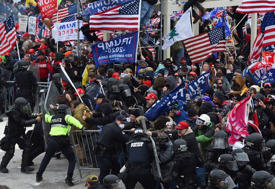 caption: When law enforcement failed to anticipate that pro-Trump supporters would devolve into a violent mob they fell victim to what one expert calls "the invisible obvious." He said it was hard for authorities to see that people who looked like them could want to commit this kind of unconstitutional violence.