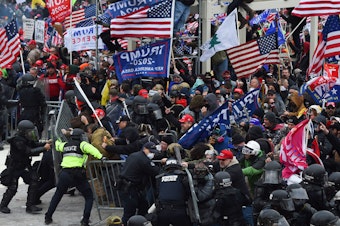 caption: When law enforcement failed to anticipate that pro-Trump supporters would devolve into a violent mob they fell victim to what one expert calls "the invisible obvious." He said it was hard for authorities to see that people who looked like them could want to commit this kind of unconstitutional violence.