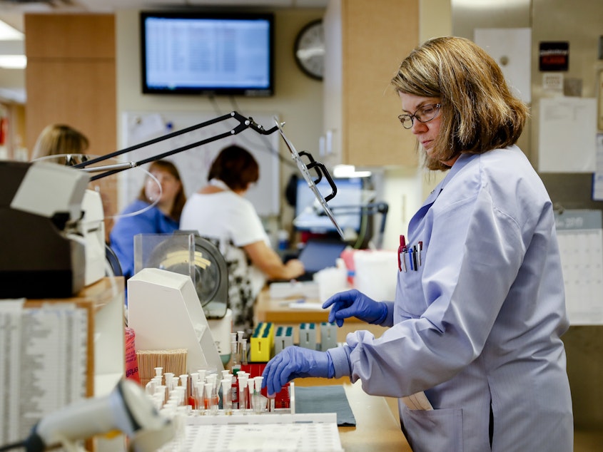 caption: Women got the lion's share of new jobs in December and now outnumber men on U.S. payrolls. This unusual situation reflects the growth of industries like health care where women dominate.