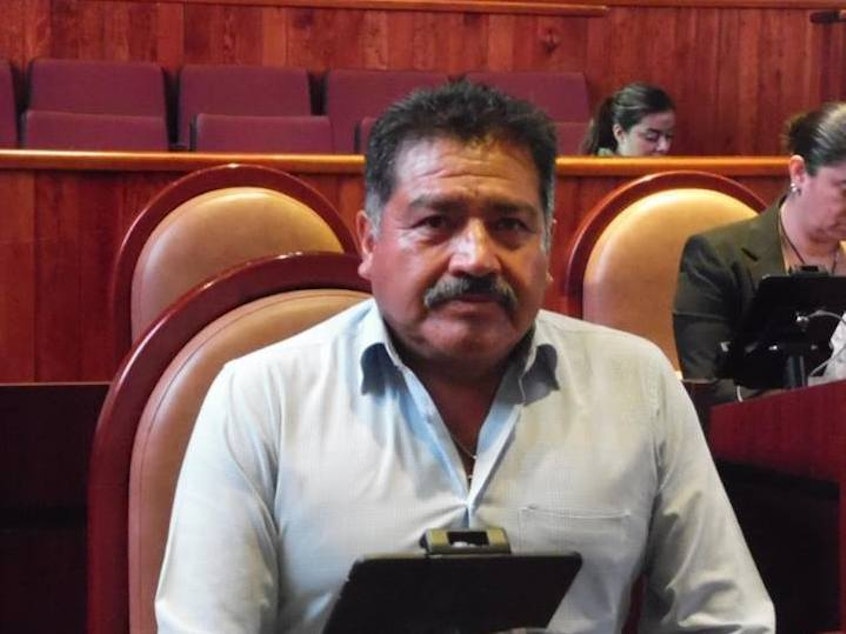 caption: Alejandro Aparicio Santiago appears in a photograph issued by the Oaxaca state government. The newly elected mayor of the town of Tlaxiaco was killed within hours of taking office.