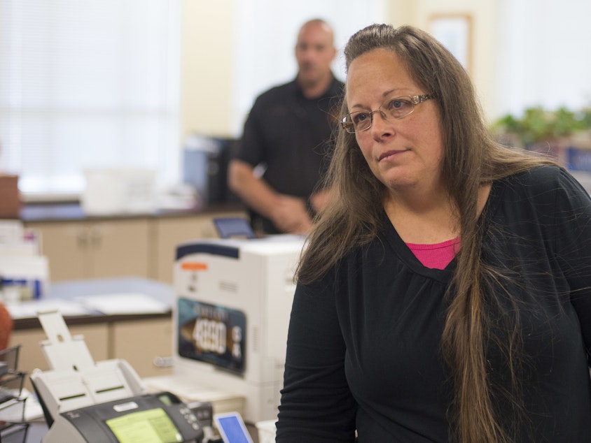 caption: Kim Davis, seen in September 2015, during the height of the controversy around her decision to refuse marriage licenses to same-sex couples. On Tuesday, Davis lost her clerkship in Rowan County, Ky.