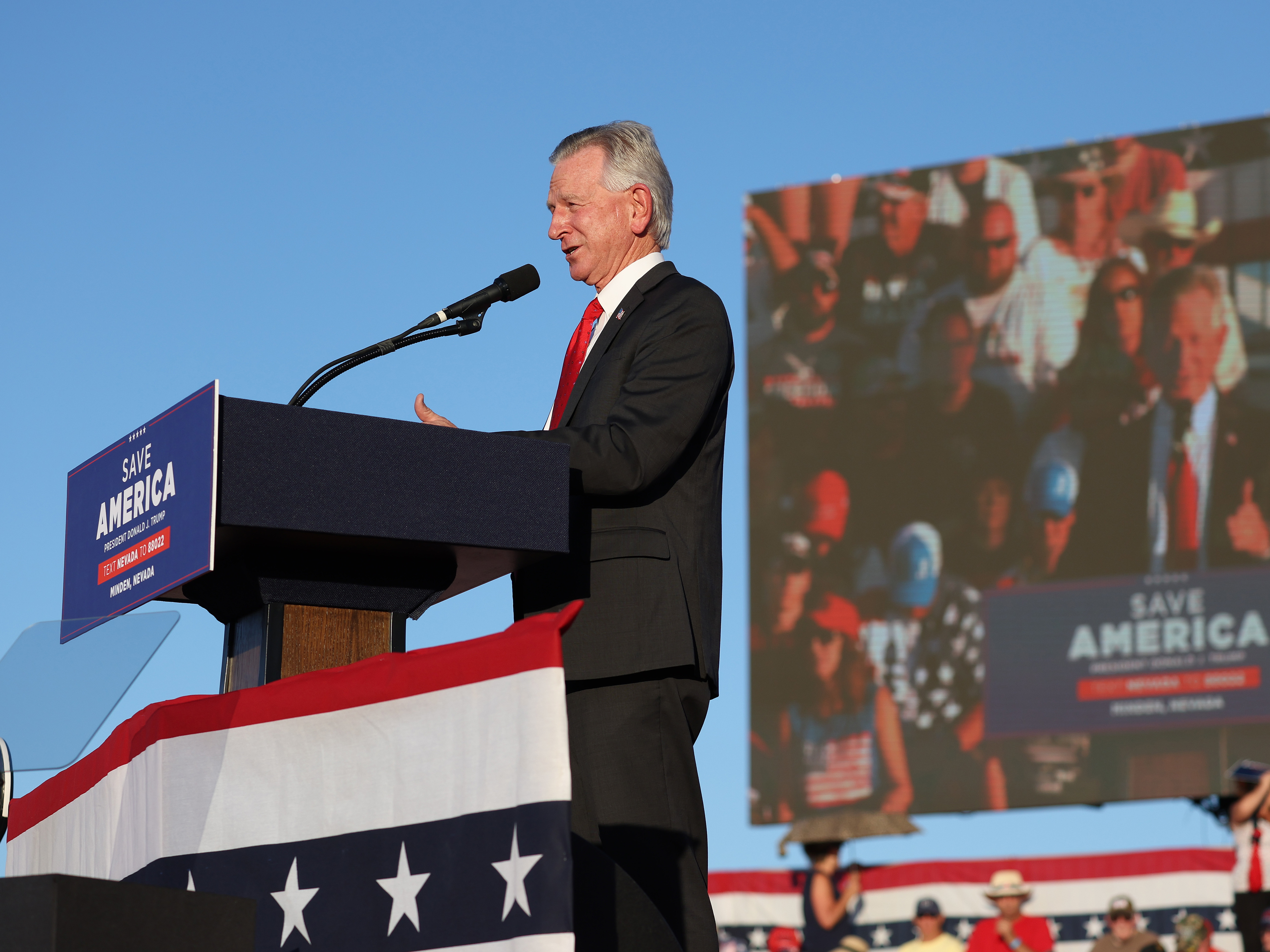 caption: U.S. Sen. Tommy Tuberville (R-Ala.) speaks during a campaign rally at Minden-Tahoe Airport on Saturday in Minden, Nevada.