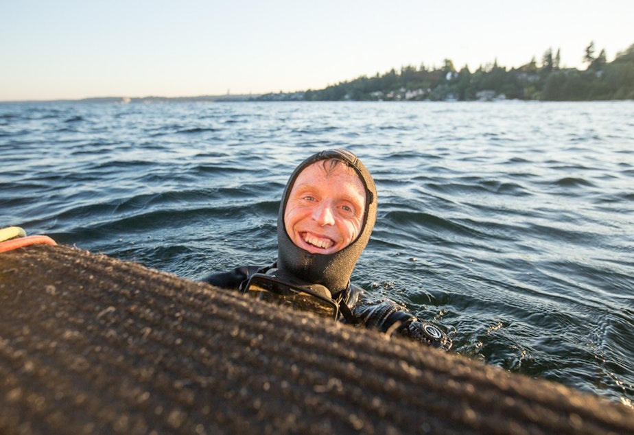 caption: Dive into the inky black waters of Lake Washington and you may find the oldest wreck recorded: A dozen coal trains from a wreck 139 years ago.
