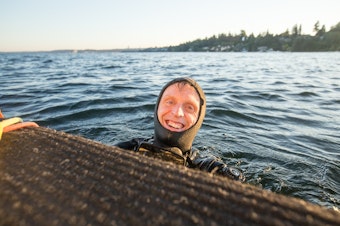 caption: Dive into the inky black waters of Lake Washington and you may find the oldest wreck recorded: A dozen coal trains from a wreck 139 years ago.
