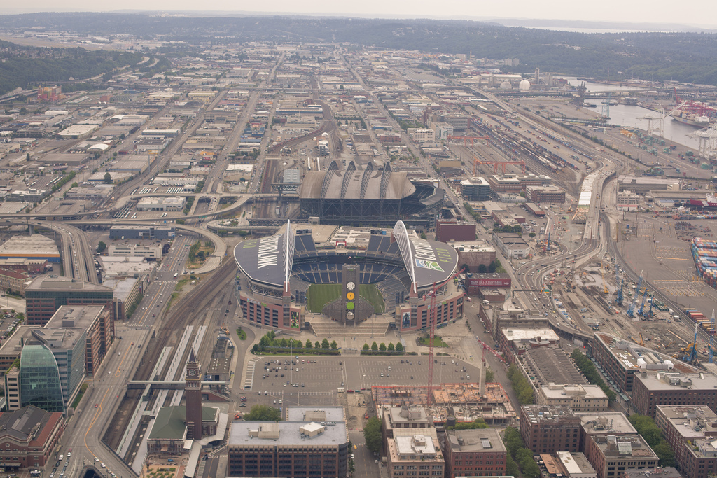 caption: The new proposed arena would sit south of Safeco Field, on Occidental Avenue between Holgate and Massachusetts Streets.
