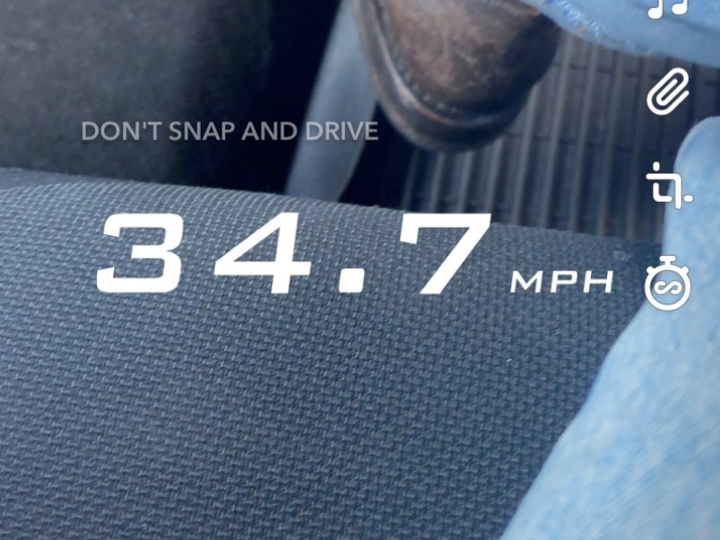 caption: An iPhone screengrab of Snapchat's speed filter, which allows users to record and share how fast they are moving. Snap told NPR that it is eliminating the tool.