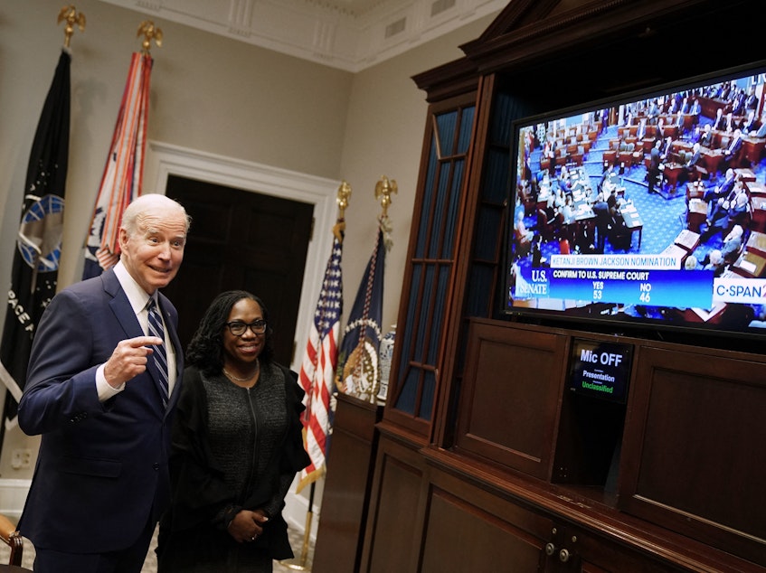 caption: President Joe Biden and Judge Ketanji Brown Jackson watch the Senate vote on Judge Brown's nomination to the Supreme Court in the Roosevelt Room of the White House on Thursday.