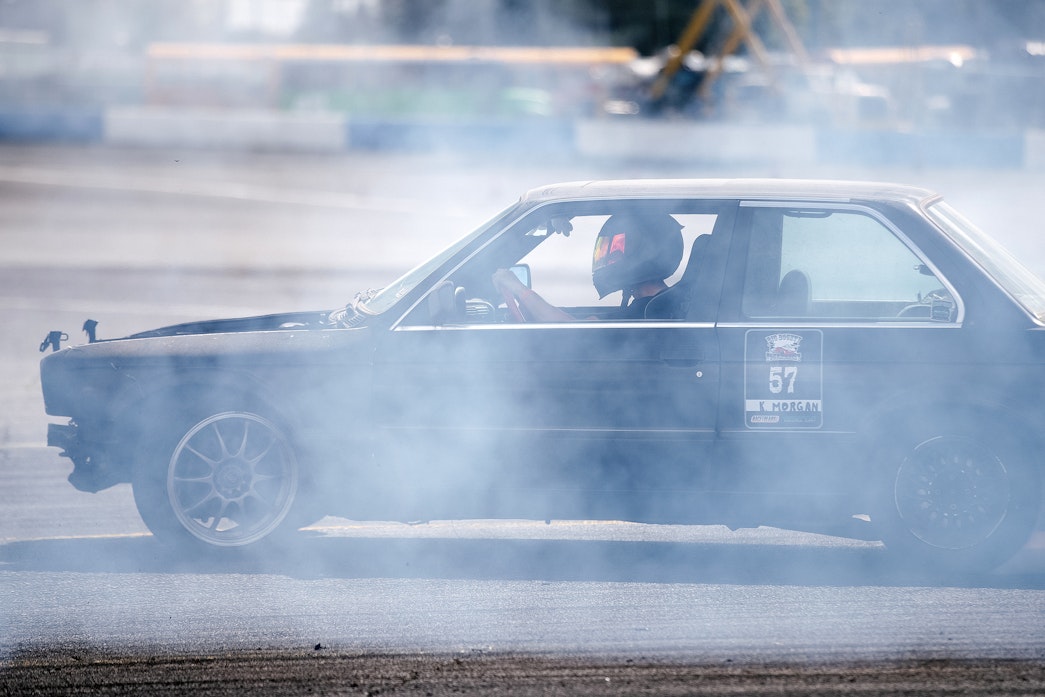 caption: Drivers compete in DriftCon on Saturday, April 19, 2025, at Evergreen Speedway in Monroe.