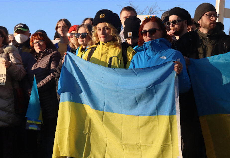 caption: A demonstration in support of Ukraine at Seattle's Space Needle, Feb. 24, 2022. 