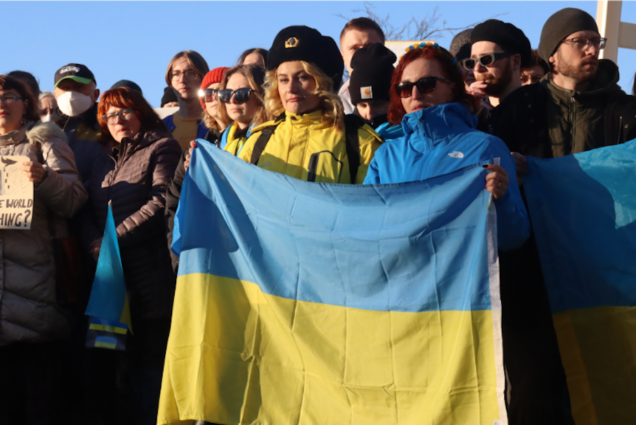 caption: A demonstration in support of Ukraine at Seattle's Space Needle, Feb. 24, 2022. 