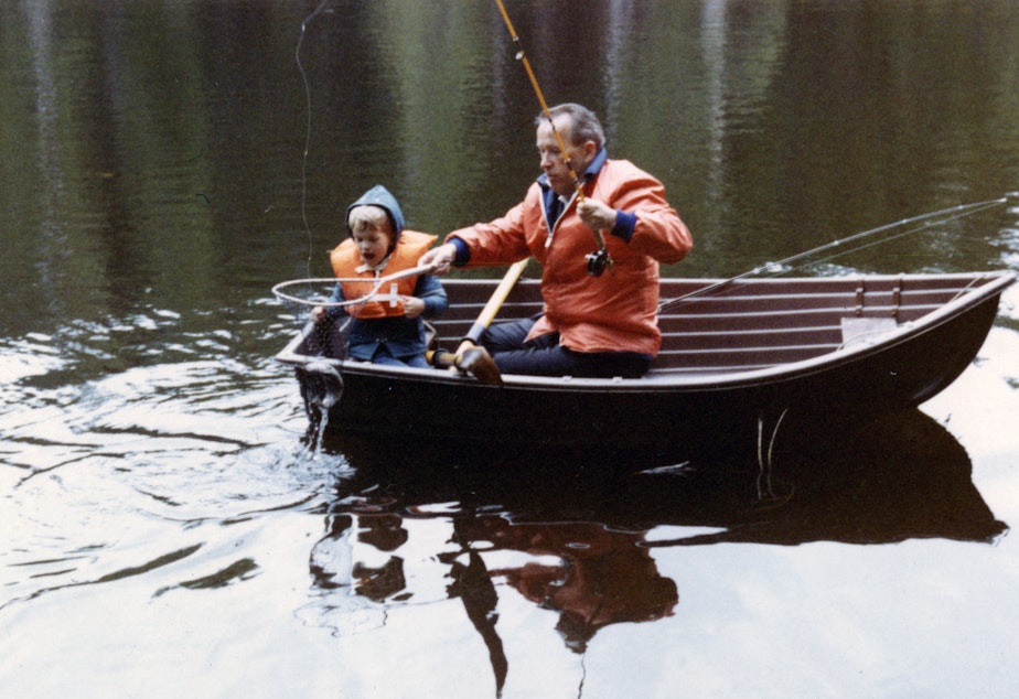 caption: Sen. Henry M. "Scoop" Jackson fishes with his son, Peter, on an unnamed lake in an undated photo.