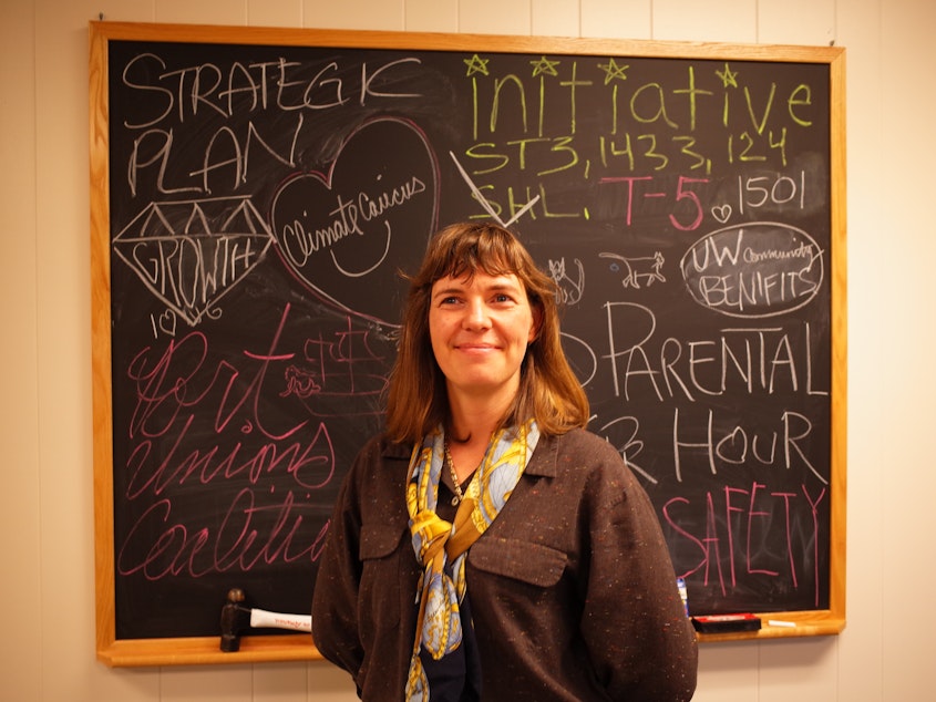 caption: Nicole Grant's blackboard still shows the causes the M.L. King County Labor Council fought for this year and won. Then, Donald Trump won the election and the labor movement risks setbacks.