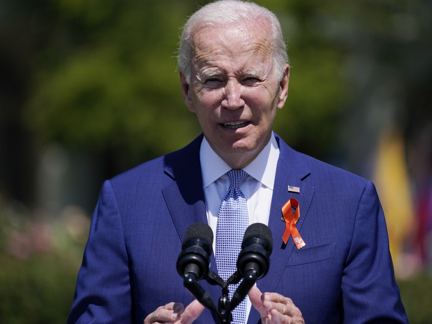 caption: President Joe Biden speaks at the White House last week. Biden signed an executive order Tuesday aimed at increasing the flow of information to families of Americans detained abroad, and at imposing sanctions on the criminals, terrorists or government officials who hold them captive.