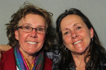caption: Lori Daigle, 55, and Liz Barnez, 54, at StoryCorps in Fort Collins, Colo.