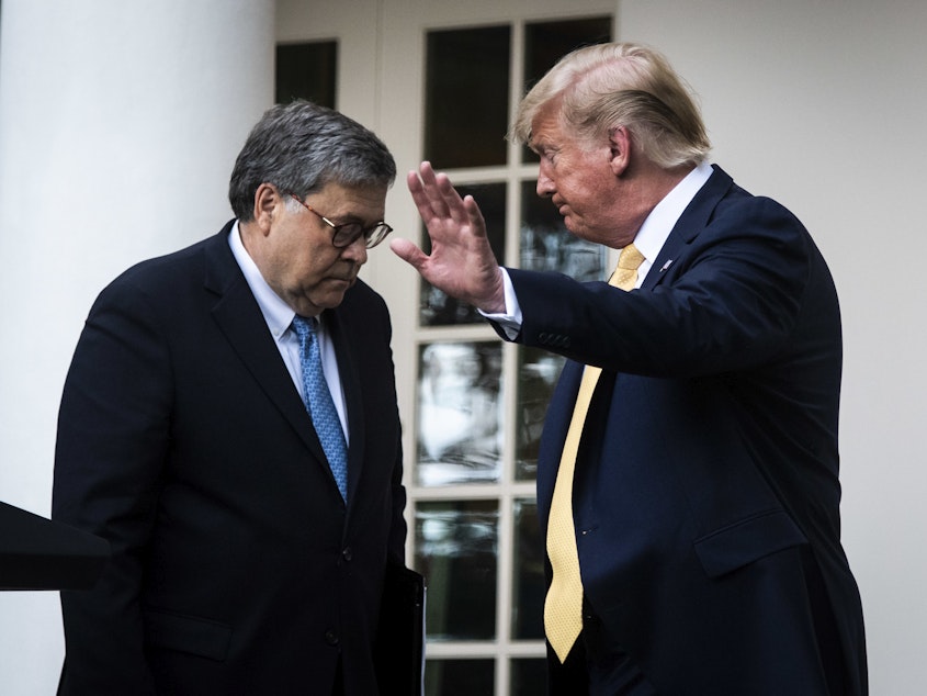 caption: President Trump and U.S. Attorney General William Barr leave after delivering remarks on the 2020 census in the White House Rose Garden in 2019 in Washington, D.C.