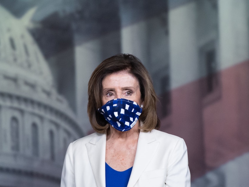 caption: Speaker of the House Nancy Pelosi wears a mask on Capitol Hill on April 30. The Senate is scheduled to return Monday, but members of the House will not return over coronavirus fears.