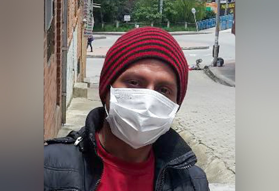 caption: Álvaro Callama is an electrician from Venezuela who fled to Colombia two years ago. He says immigrants in the country are struggling after the authorities passed measures to prevent the spread of the new coronavirus.