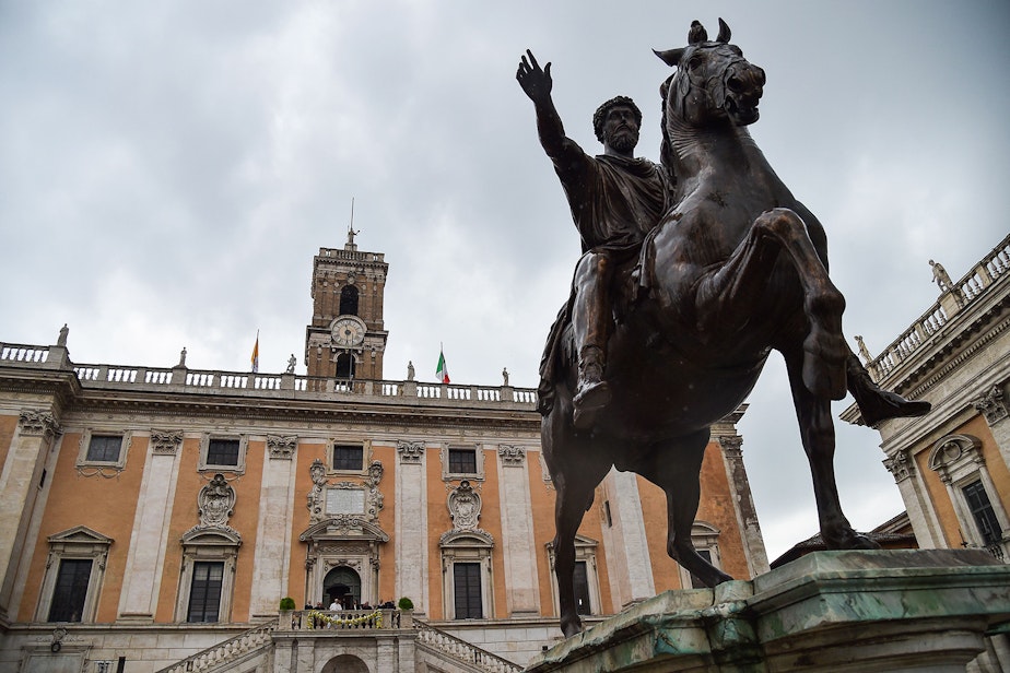 caption: Rome's City Hall by an equestrian statue of Marcus Aurelius. (Andreas Solaro/AFP/Getty Images)
