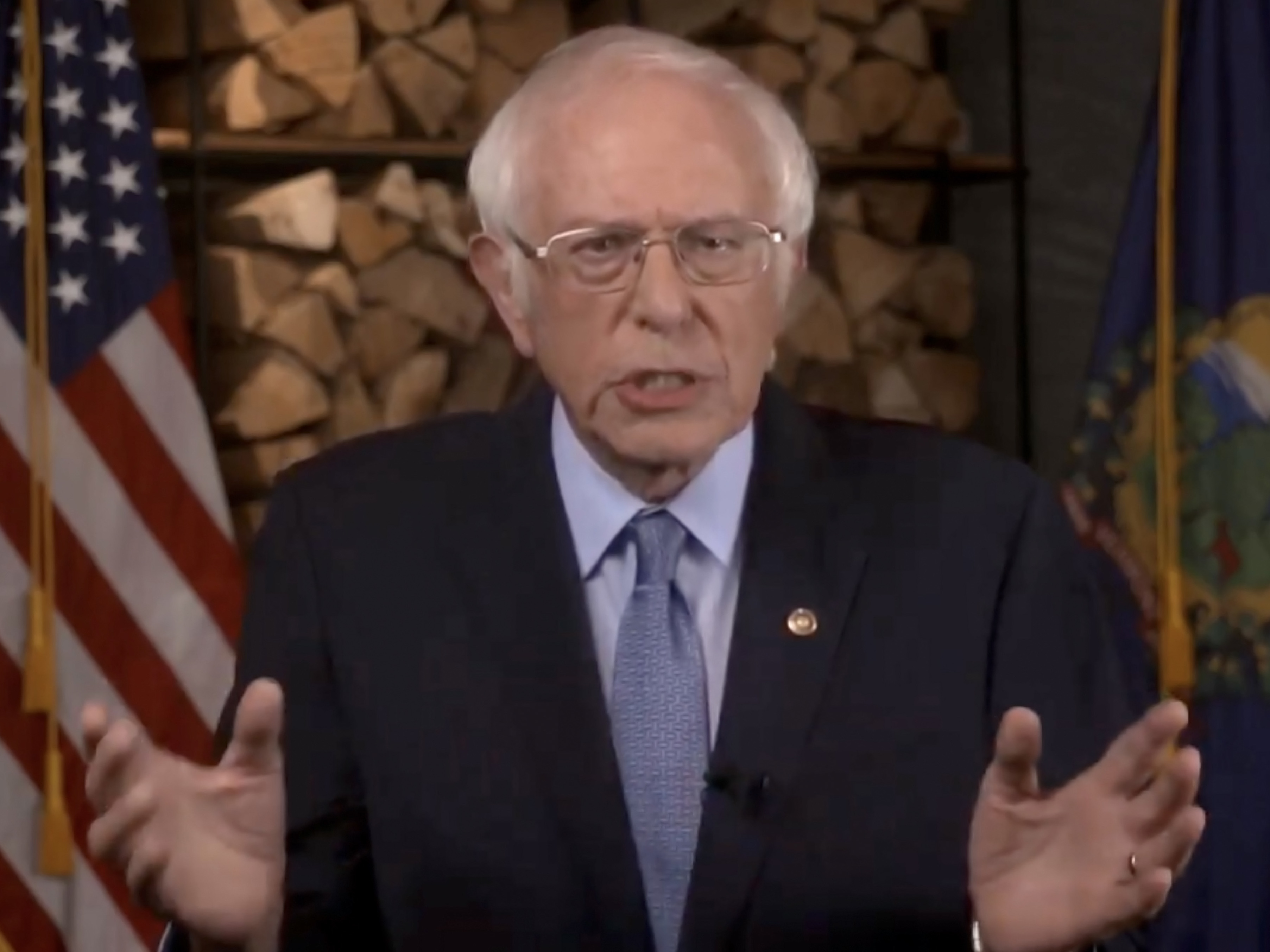 caption: Sen. Bernie Sanders, I-Vt., addresses the virtual Democratic National Convention on Monday evening.
