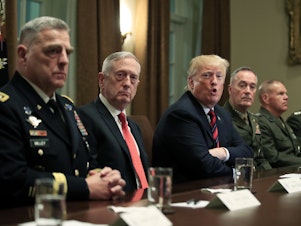 caption: President Donald Trump in October 2018 with, from left, Army Chief of Staff Gen. Mark Milley, Defense Secretary Jim Mattis, Chairman of the Joint Chiefs of Staff Gen. Joseph Dunford and Marine Corps Commandant Gen. Robert Neller.
