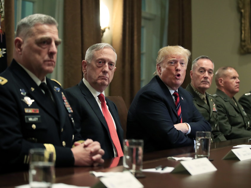 caption: President Donald Trump in October 2018 with, from left, Army Chief of Staff Gen. Mark Milley, Defense Secretary Jim Mattis, Chairman of the Joint Chiefs of Staff Gen. Joseph Dunford and Marine Corps Commandant Gen. Robert Neller.