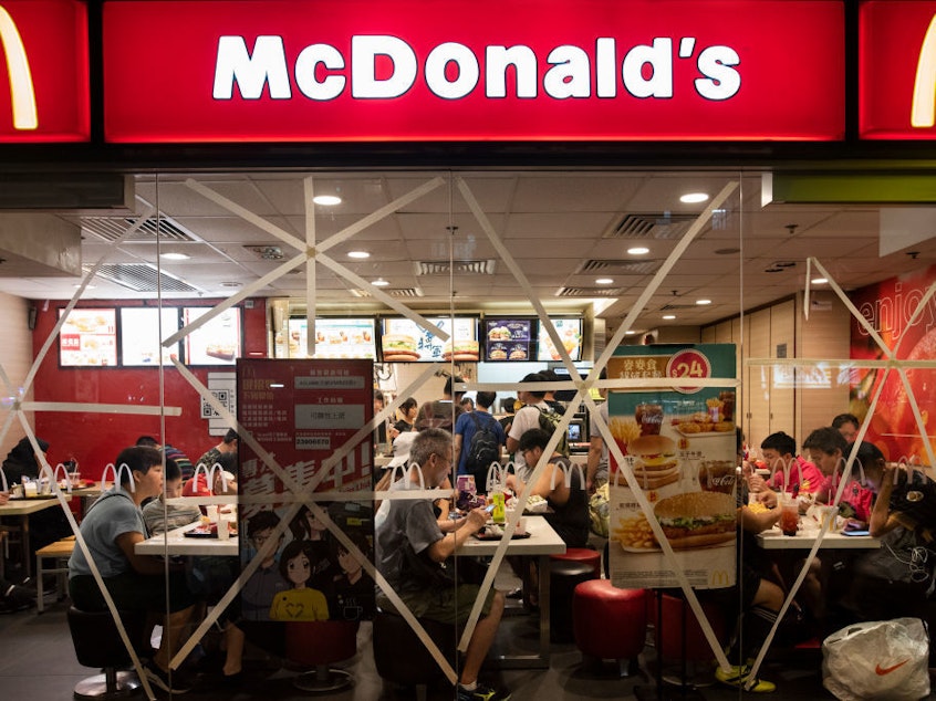 caption: More kids are eating at fast food chains like McDonald's, according to a new study, but parents are buying the healthier side options only about half the time.