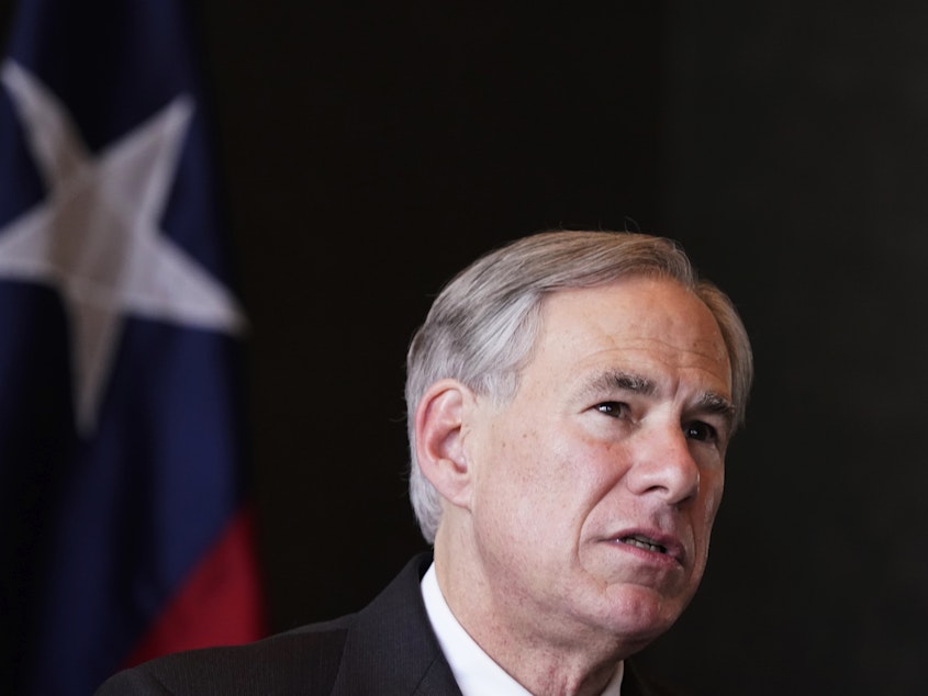 caption: Texas Gov. Greg Abbott has signed into law a bill that bans abortion beginning at around six weeks.