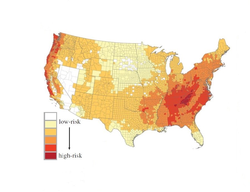 caption: Counties along the West Coast and the southern Appalachians are at highest risk of salamander dieoffs, based on the number of salamander species found there and the areas' environmental suitability for an invasion of Bsal fungus.