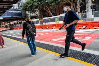 caption: Police would write no more tickets for jaywalking if the Washington Legislature overcomes skepticism about a pending legalization proposal.