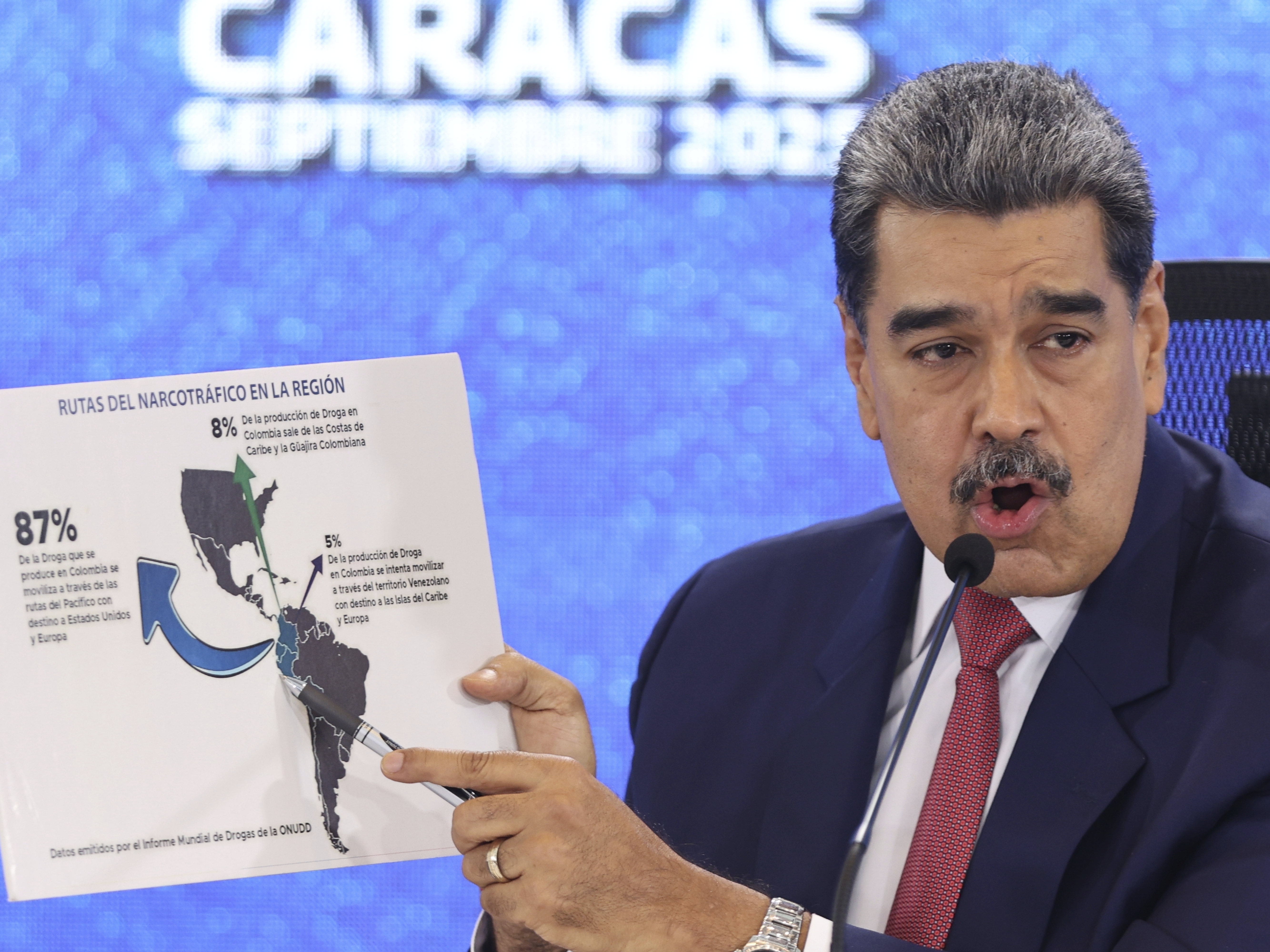 caption: Venezuelan President Nicolas Maduro points at a map of the Americas during a press conference in Caracas, Venezuela, on Monday.