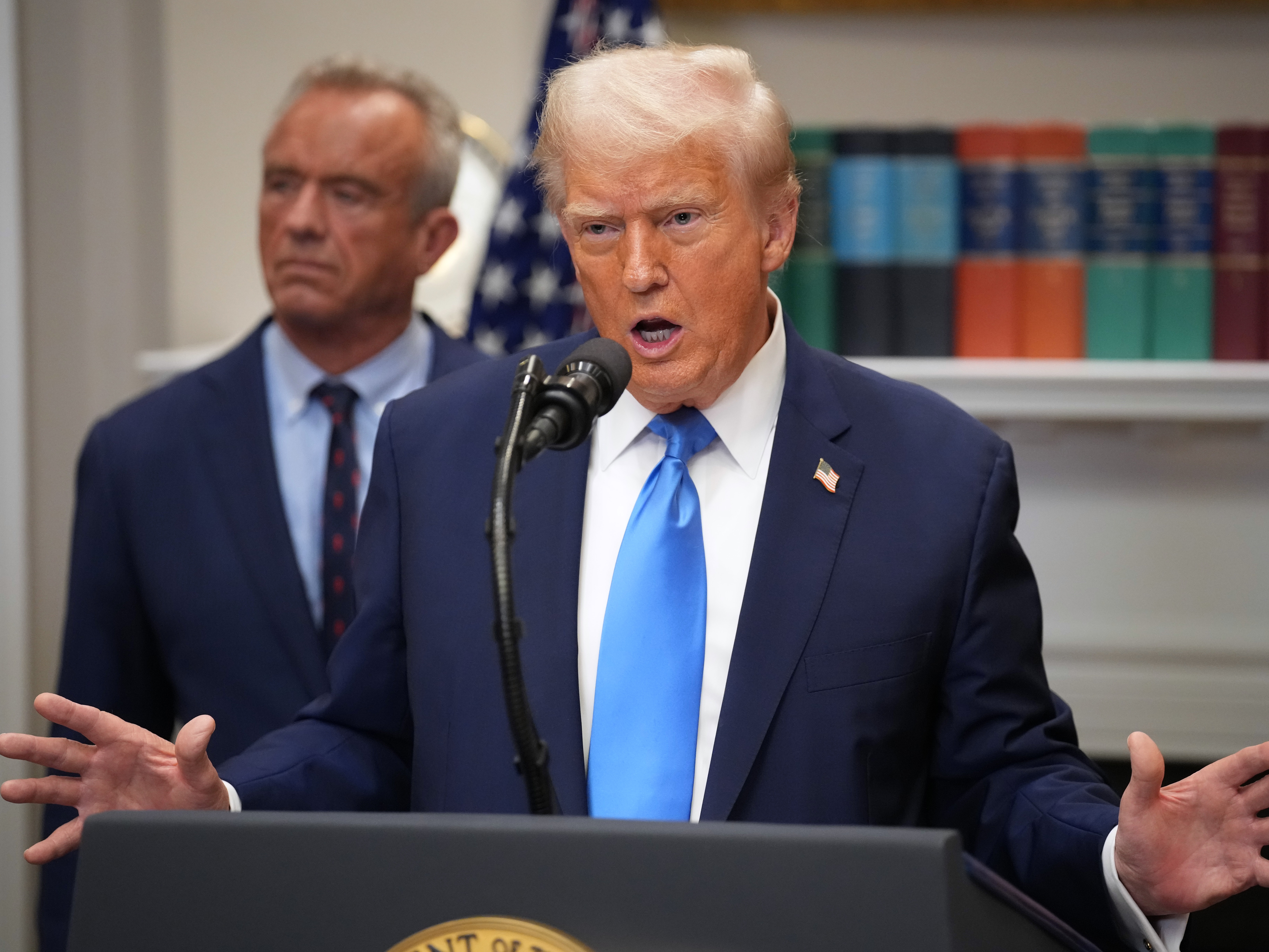 caption: President Trump answers questions after making an announcement on "significant medical and scientific findings for America's children" at the White House on Sept. 22. Federal health officials suggested a link between the use of acetaminophen during pregnancy as a risk for autism, although many health agencies have noted inconclusive results in the research.