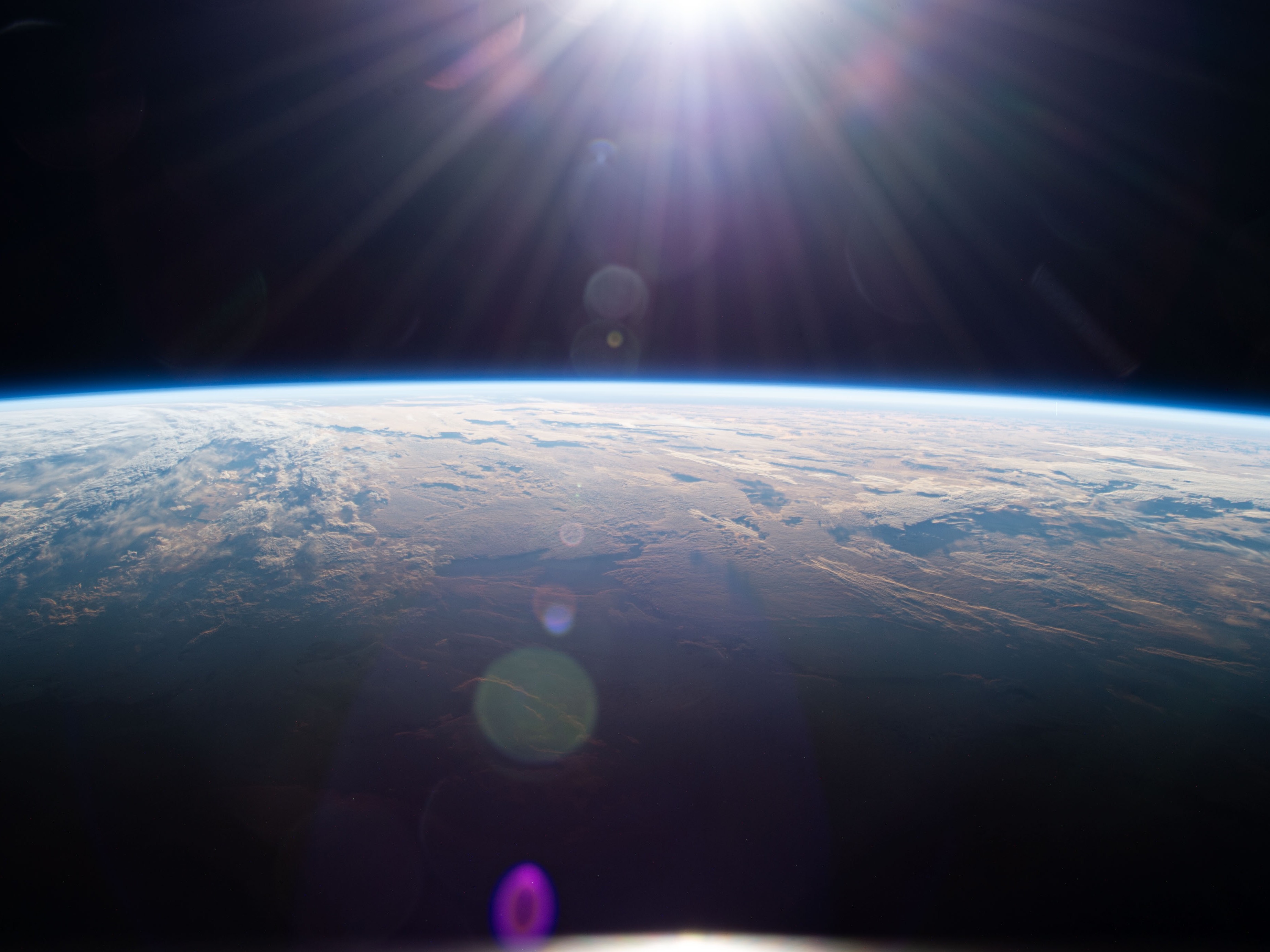 caption: Tiny variations in the weather, tides and even the liquid inside the Earth's core can affect the length of the day.