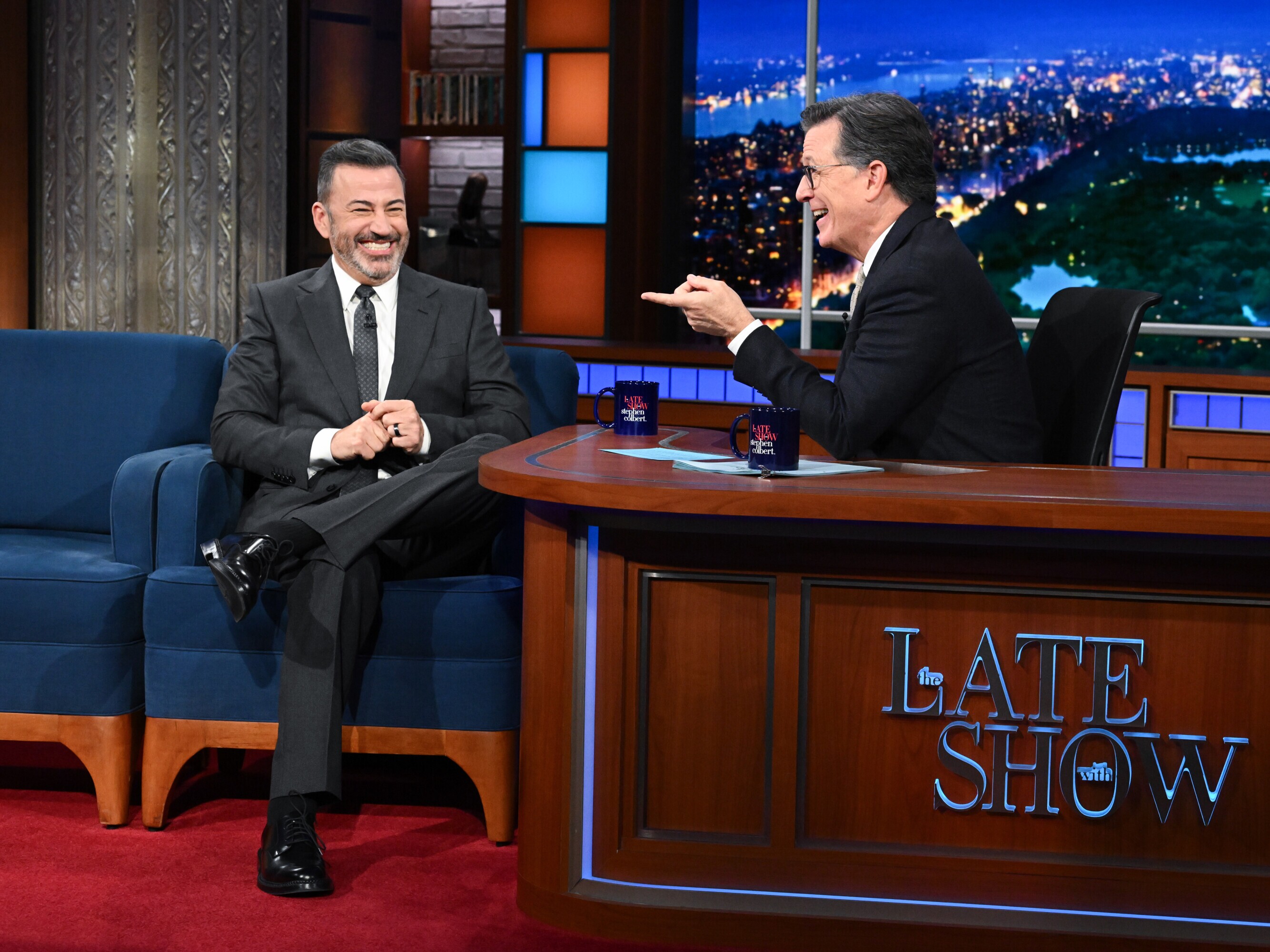 caption: Jimmy Kimmel appeared as a guest on <em>The Late Show with Stephen Colbert</em> on Tuesday, September 30, a week after Kimmel's return to ABC.