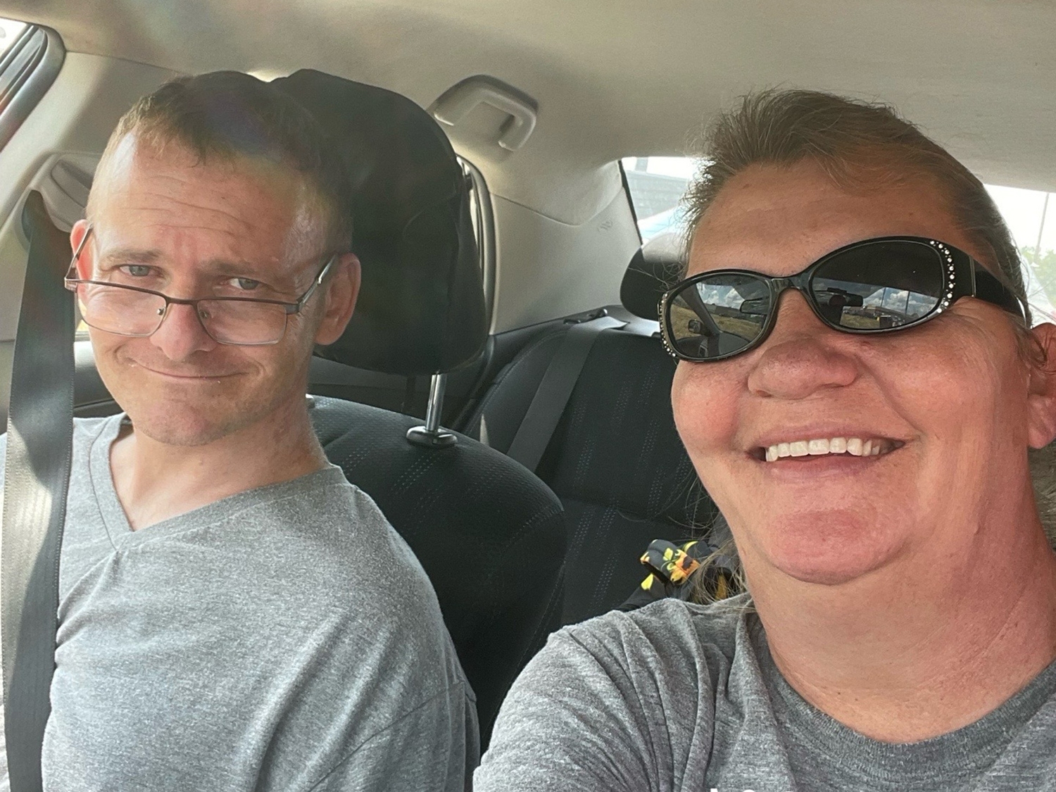 caption: TJ Hoover, left, and his sister, Donna Rhorer. In October 2021, Hoover was declared dead and on the brink of having his organs removed to be transplanted into other people. The surgery was halted in the operating room.