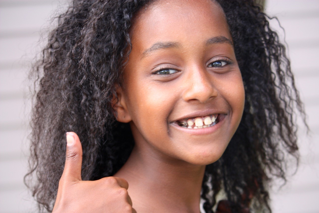 caption: Meri Putnam, age 11. She was adopted from Ethiopia at age 5.