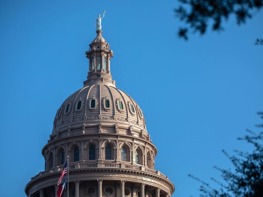caption: The Texas state Capitol is seen on Oct. 2. The Justice Department is suing over the state's restrictive abortion law and heading back to the Supreme Court to seek a halt to it while legal proceedings continue.