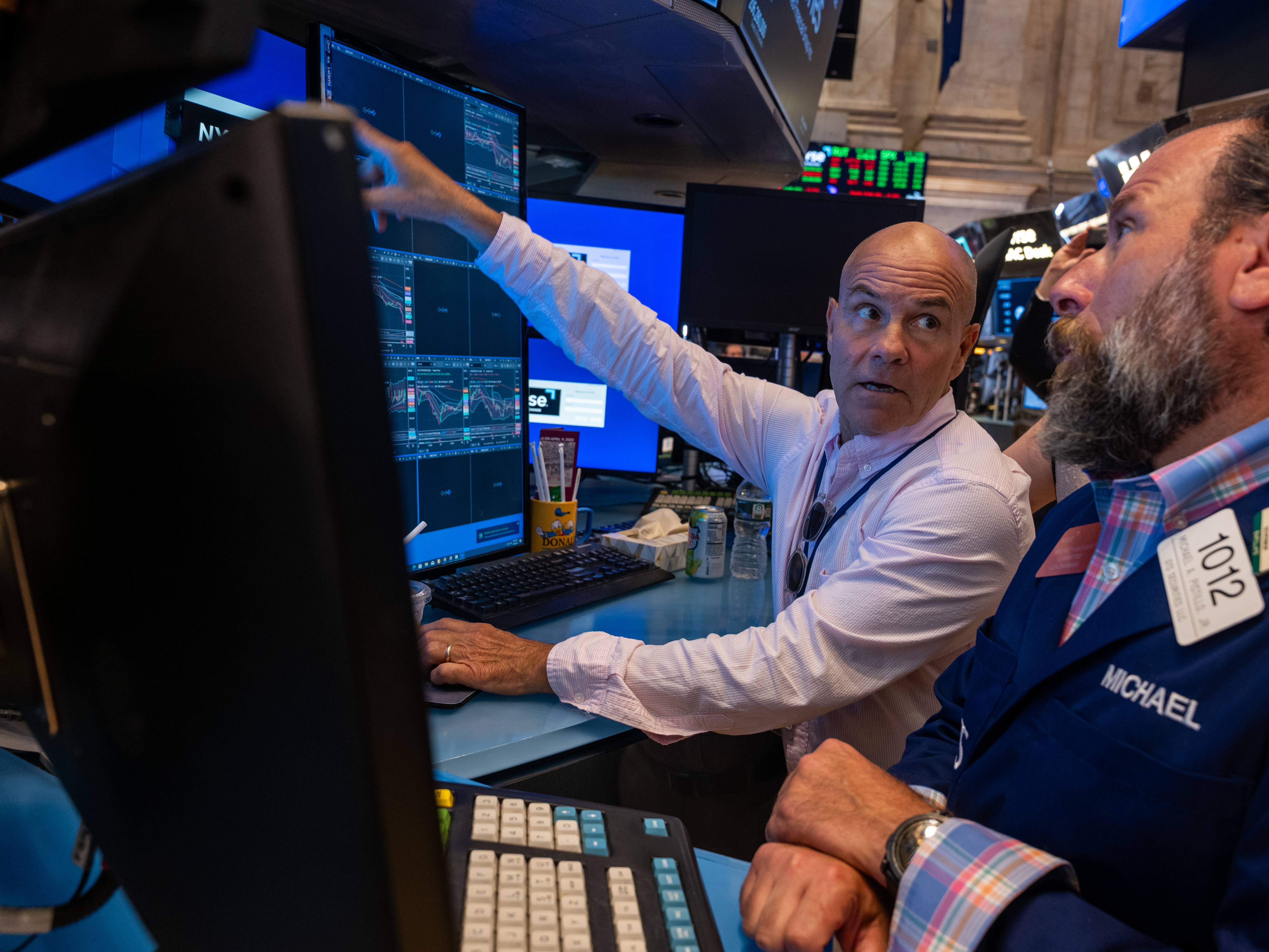caption: Stocks slumped after President Trump unveiled a new round of global tariffs and after the U.S. created fewer jobs than expected in July.